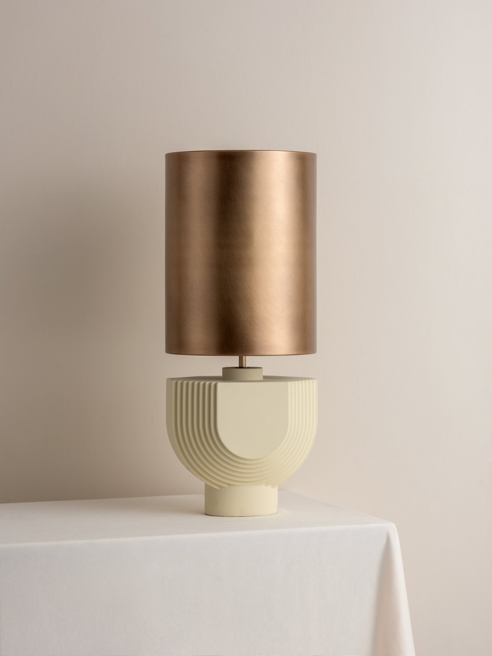 Editions concrete lamp with + aged brass shade