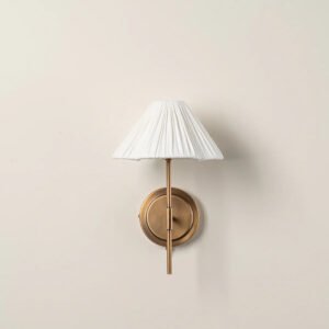 Lindi - aged brass and linen scalloped wall light